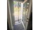 Open doorway showing the transition from indoors to the backyard, offering an inviting glimpse of outdoor space at 3484 Lynley Mill Ln, Dacula, GA 30019