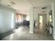 Inviting foyer with tile flooring leading to a dining area with natural light at 3484 Lynley Mill Ln, Dacula, GA 30019