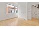 A cozy bedroom features hardwood floors, white trim, a window, and a closet at 367 Parkway Ne Dr # 3, Atlanta, GA 30312
