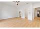 A neutral bedroom features hardwood floors, white trim, and access to an ensuite bathroom at 367 Parkway Ne Dr # 3, Atlanta, GA 30312