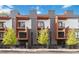 Modern townhome exterior with sleek design, balconies, and professional landscaping at 367 Parkway Ne Dr # 3, Atlanta, GA 30312