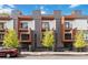 Modern townhome featuring sleek architectural design, balconies, and well-maintained landscaping at 367 Parkway Ne Dr # 3, Atlanta, GA 30312