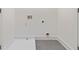 A utility room features gray tile floors with hookups for laundry at 367 Parkway Ne Dr # 3, Atlanta, GA 30312