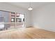 Bright living area featuring hardwood floors and a large window at 367 Parkway Ne Dr # 3, Atlanta, GA 30312