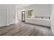 Bright living area featuring hardwood floors, modern trim and a large window at 367 Parkway Ne Dr # 3, Atlanta, GA 30312