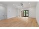 Bright living area featuring hardwood floors, modern trim and a ceiling fan at 367 Parkway Ne Dr # 3, Atlanta, GA 30312
