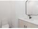Sleek powder room features modern fixtures, a rectangular mirror, and vanity at 367 Parkway Ne Dr # 6, Atlanta, GA 30312