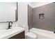 Chic bathroom showcasing vanity, a tub with shower, and a recessed niche at 367 Parkway Ne Dr # 6, Atlanta, GA 30312
