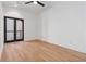 Bright bedroom with hardwood floors and a door to the balcony at 367 Parkway Ne Dr # 6, Atlanta, GA 30312
