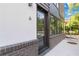 Welcoming entry with modern door, brick foundation, and ample natural light at 367 Parkway Ne Dr # 6, Atlanta, GA 30312
