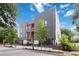 Contemporary exterior showcasing gray siding, balconies, and mature trees adding natural charm at 367 Parkway Ne Dr # 6, Atlanta, GA 30312