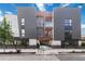 Modern townhome exterior featuring gray siding, balconies, and well-maintained landscaping at 367 Parkway Ne Dr # 6, Atlanta, GA 30312