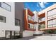 Modern exterior with stacked balconies, garage, and stylish architectural details at 367 Parkway Ne Dr # 6, Atlanta, GA 30312