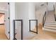 Hallway features hardwood floors, modern railings and a staircase to the upper level at 367 Parkway Ne Dr # 6, Atlanta, GA 30312