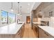Elegant kitchen with stainless steel appliances, an expansive island, and large windows at 367 Parkway Ne Dr # 6, Atlanta, GA 30312