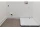 Tiled laundry room featuring hookups, providing a functional space for laundry needs at 367 Parkway Ne Dr # 6, Atlanta, GA 30312