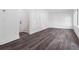 Bright living room featuring luxury vinyl floors and large windows, creating an inviting space at 367 Parkway Ne Dr # 6, Atlanta, GA 30312