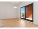 Bright living room features hardwood floors and access to a private balcony at 367 Parkway Ne Dr # 6, Atlanta, GA 30312