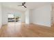 Bright, modern living room with wood floors, large windows, and neutral walls at 367 Parkway Ne Dr # 6, Atlanta, GA 30312