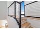 Bright staircase featuring a modern railing at 367 Parkway Ne Dr # 6, Atlanta, GA 30312