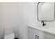 Powder room with a modern vanity, matte black hardware and neutral decor at 367 Parkway Ne Dr # 9, Atlanta, GA 30312