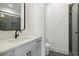Stylish bathroom with a modern vanity, black hardware, and a glass-enclosed shower with gray tiled walls at 367 Parkway Ne Dr # 9, Atlanta, GA 30312