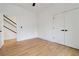 Neutral bedroom with wood floors, double closets, and modern doors at 367 Parkway Ne Dr # 9, Atlanta, GA 30312