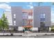 Modern townhome exterior featuring a gated entrance, bicycle storage, and a sleek, contemporary facade at 367 Parkway Ne Dr # 9, Atlanta, GA 30312