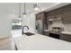 Contemporary kitchen with a quartz countertop island, stainless steel appliances, and modern pendant lighting at 367 Parkway Ne Dr # 9, Atlanta, GA 30312