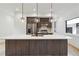 Kitchen with center island, stainless steel appliances, modern lighting and white subway tile backsplash at 367 Parkway Ne Dr # 9, Atlanta, GA 30312