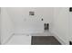 A functional laundry room features a tile floor with modern hookups at 367 Parkway Ne Dr # 9, Atlanta, GA 30312