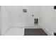 Functional laundry room with tile flooring, hookups, and a recessed area for appliances at 367 Parkway Ne Dr # 9, Atlanta, GA 30312