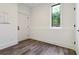 Neutral room with LVP flooring, a door and a window with an exterior view at 367 Parkway Ne Dr # 9, Atlanta, GA 30312
