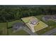 An aerial view showcases this home's prime location amidst lush greenery and well-manicured lawns at 1660 Chandler Rd, Lawrenceville, GA 30045