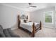 Comfortable bedroom featuring natural light, a decorative bed frame, and a relaxing ambiance at 1660 Chandler Rd, Lawrenceville, GA 30045
