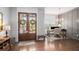 Elegant foyer with hardwood floors, a view of the office, and a double-door entry at 1660 Chandler Rd, Lawrenceville, GA 30045