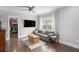 Relaxing sitting room features hardwood floors, natural lighting and leads to a walk-in closet at 1660 Chandler Rd, Lawrenceville, GA 30045