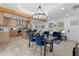 Open-concept living space with modern kitchen, dining area, and cozy seating, perfect for entertaining and relaxing at 2014 Fence Rd, Dacula, GA 30019