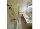 Bathroom with classic fixtures, functional storage and marble vanity at 3190 Cheru Ct, Decatur, GA 30034