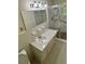 Bathroom features sink and vanity, with walk-in shower and glass doors at 3190 Cheru Ct, Decatur, GA 30034