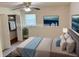 Virtual staging of a bedroom with blue accents, a bed, and closet at 3190 Cheru Ct, Decatur, GA 30034
