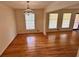 Bright dining room featuring refinished hardwood floors and natural light at 3190 Cheru Ct, Decatur, GA 30034