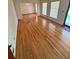 Open-concept living room boasts gleaming hardwood floors and abundant natural light at 3190 Cheru Ct, Decatur, GA 30034