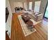 Living room with hardwood floors, area rug, sofa, and coffee table at 3190 Cheru Ct, Decatur, GA 30034