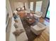 Bright living room featuring hardwood floors, area rug, and stylish furnishings at 3190 Cheru Ct, Decatur, GA 30034
