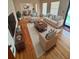 Living room with hardwood floors, area rug, sofa, and chairs at 3190 Cheru Ct, Decatur, GA 30034
