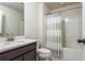 Clean bathroom with a tub, shower, and neutral color scheme at 5025 Bryce Ln, Cumming, GA 30040