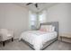 Comfortable bedroom with large bed, area rug, and natural light at 5025 Bryce Ln, Cumming, GA 30040