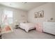 Stylized bedroom with a teepee, modern furniture, and bright accents at 5025 Bryce Ln, Cumming, GA 30040