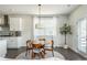 Bright dining area features modern finishes and plenty of natural light at 5025 Bryce Ln, Cumming, GA 30040